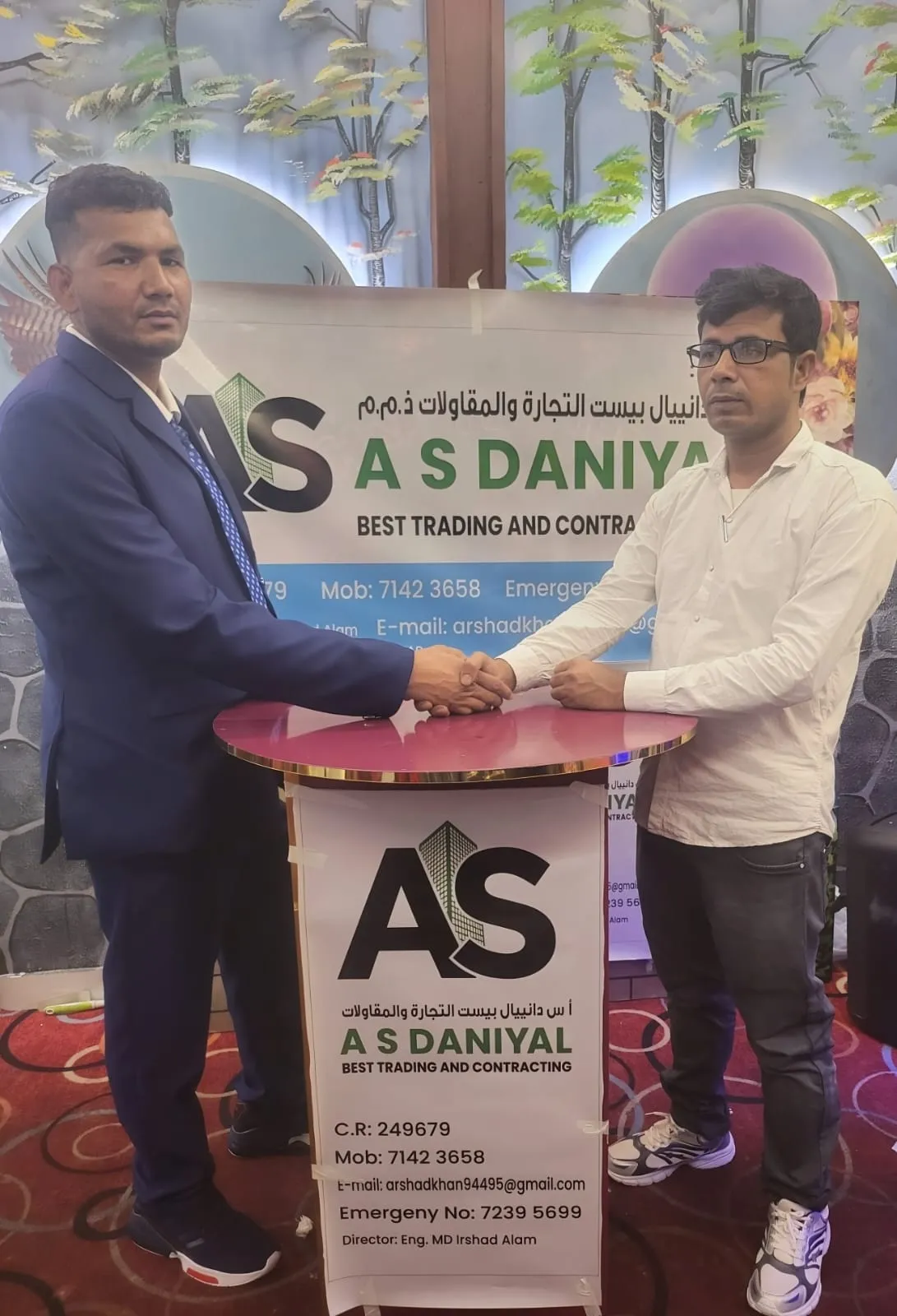 Eng. MD Irshad Alam and a partner at an A.S. Daniyal signing